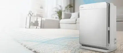 White rectangular air purifier with a sleek, modern design and subtle branding on the front.